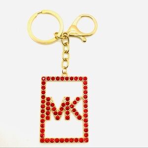 Purse Charm Key Chain MK in Red Crystals set in golden tone.